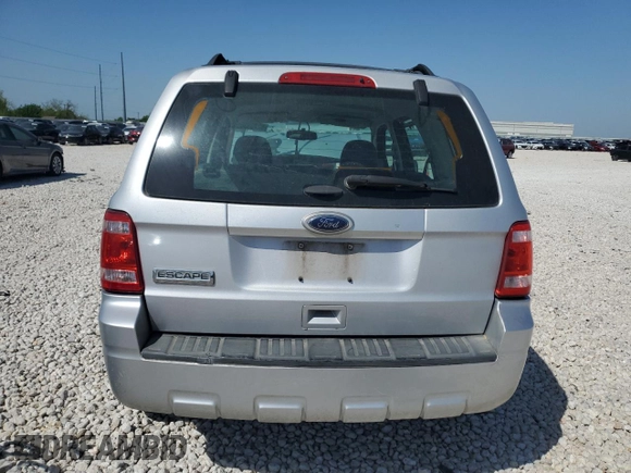 2011 Ford Escape XLS с VIN 1FMCU0C70BKB97667, выставлен на аукционе Copart как лот 52709365 с пробегом 140 582 миль миль и Списание • Salvage title. История ставок и продаж доступна на DreamBid. Изображение 6.