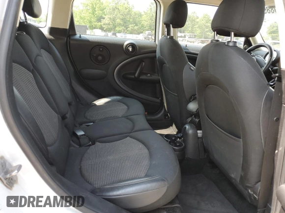 2014 MINI Countryman S with VIN WMWZC5C5XEWP37128, listed as a Copart auction lot 59549885 with 84,121 mi miles and Salvage title. Bid and sale history available at DreamBid. Image 10.