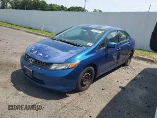 2012 Honda Civic LX z VIN 2HGFB2F51CH515058, wystawiony jako Copart lot #60691465 z przebiegiem 6 009 mil mil oraz Czysty tytuł • Clean title. Historia ofert i sprzedaży dostępna na DreamBid. Obrazek 1.