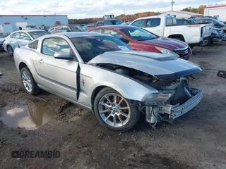 2010 Ford Mustang V6 with VIN 1ZVBP8AN0A5158434, listed as a IAAI auction lot 40926656 with 158,245 mi miles. Bid and sale history available at carsss.com. Image 1.