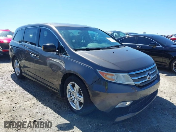 2012 Honda Odyssey Touring with VIN 5FNRL5H91CB057344, listed as a IAAI auction lot 41835272 with 158,854 mi miles. Bid and sale history available at carsss.com. Image 1.