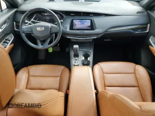 2019 Cadillac XT4 FWD Premium Luxury with VIN 1GYFZCR43KF151044, listed as a Copart auction lot 57912915 with 71,138 mi miles and Salvage title. Bid and sale history available at DreamBid. Image 8.