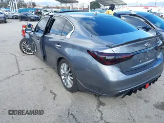 2019 Infiniti Q50 Luxe z VIN JN1EV7APXKM512617, wystawiony jako IAAI lot #41517907 z przebiegiem 46 619 mil mil oraz . Historia ofert i sprzedaży dostępna na DreamBid. Obrazek 3.