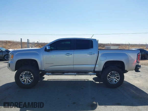 2016 GMC Canyon 2WD SLT with VIN 1GTG5DE36G1104362, listed as a IAAI auction lot 41517077 with 169,641 mi miles. Bid and sale history available at carsss.com. Image 14.