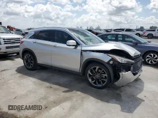 2019 Infiniti QX50 Luxe with VIN 3PCAJ5M10KF115123, listed as a Copart auction lot 57309395 with 122,978 mi miles and Salvage title. Bid and sale history available at DreamBid. Image 4.