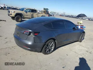 2023 Tesla Model 3 with VIN 5YJ3E1EA6PF713275, listed as a Copart auction lot 41683315 with 26,463 mi miles and Salvage Title. Bid and sale history available at DreamBid. Image 3.