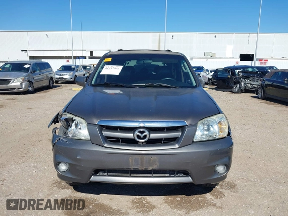 2005 Mazda Tribute S with VIN 4F2CZ06175KM49643, listed as a IAAI auction lot 41397843 with 185,088 mi miles and . Bid and sale history available at carsss.com. Image 12.
