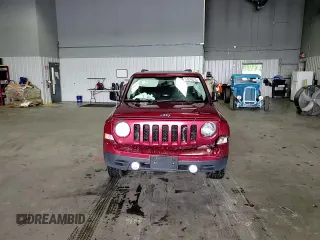 2014 Jeep Patriot Latitude with VIN 1C4NJRFB7ED855780, listed as a Copart auction lot 57246515 with 110,433 mi miles and Salvage title. Bid and sale history available at DreamBid. Image 14.