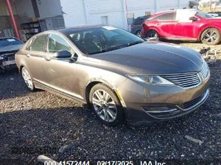 2015 Lincoln MKZ with VIN 3LN6L2J90FR623035, listed as a IAAI auction lot 41572444 with 115,153 mi miles and . Bid and sale history available at DreamBid. Image 1.