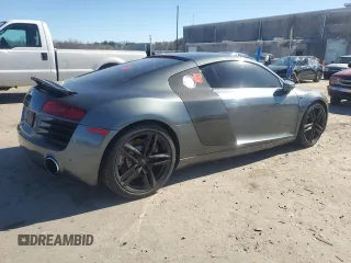 2014 Audi R8 z VIN WUAAUAFG0EN000936, wystawiony jako Copart lot #46513185 z przebiegiem Nie podano mil oraz Szkoda całkowita • Salvage title. Historia ofert i sprzedaży dostępna na DreamBid. Obrazek 3.