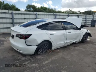 2023 Tesla Model 3 z VIN 5YJ3E1EA7PF576489, wystawiony jako Copart lot #61039505 z przebiegiem 35 243 mil mil oraz Nie do naprawy • Non repairable. Historia ofert i sprzedaży dostępna na DreamBid. Obrazek 3.