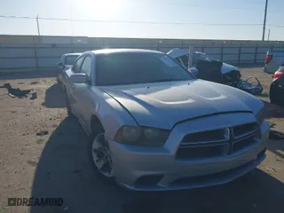 2012 Dodge Charger SE with VIN 2C3CDXBGXCH218391, listed as a IAAI auction lot 41765309 with 232,854 mi miles. Bid and sale history available at carsss.com. Image 1.