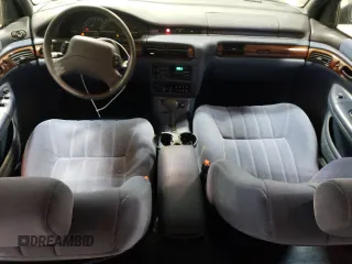 1993 Chrysler Concorde z VIN 2C3EL56T1PH575522, wystawiony jako Copart lot #82903344 z przebiegiem 175 657 mil mil oraz Tytuł czysty. Historia ofert i sprzedaży dostępna na DreamBid. Obrazek 8.