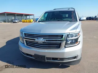 2015 Chevrolet Tahoe LTZ with VIN 1GNSKCKC5FR205739, listed as a IAAI auction lot 40020644 with 142,524 mi miles and . Bid and sale history available at DreamBid. Image 6.