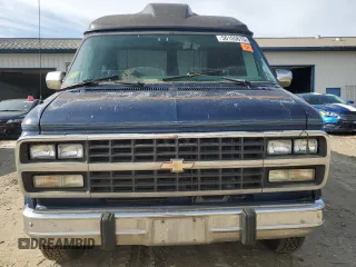 1995 Chevrolet Chevy Van с VIN 1GBEG25K1SF242663, выставлен на аукционе Copart как лот 56105615 с пробегом 140 366 миль миль и Чистый • Clean title. История ставок и продаж доступна на DreamBid. Изображение 5.
