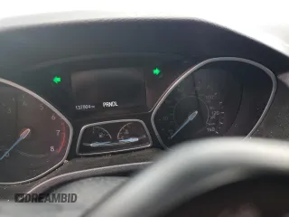 2016 Ford Focus SE z VIN 1FADP3F2XGL253736, wystawiony jako Copart lot #51758415 z przebiegiem 137 904 mil mil oraz Szkoda całkowita • Salvage title. Historia ofert i sprzedaży dostępna na DreamBid. Obrazek 9.