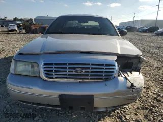 2004 Ford Crown Victoria LX with VIN 2FDFP74W74X150801, listed as a Copart auction lot 43869115 with 138,243 mi miles and Salvage Title. Bid and sale history available at carsss.com. Image 5.
