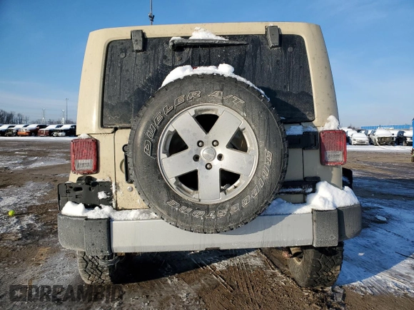 2011 Jeep Wrangler Sahara with VIN 1J4AA5D12BL525204, listed as a Copart auction lot 45152565 with 62,860 mi miles and Clean Title. Bid and sale history available at DreamBid. Image 6.