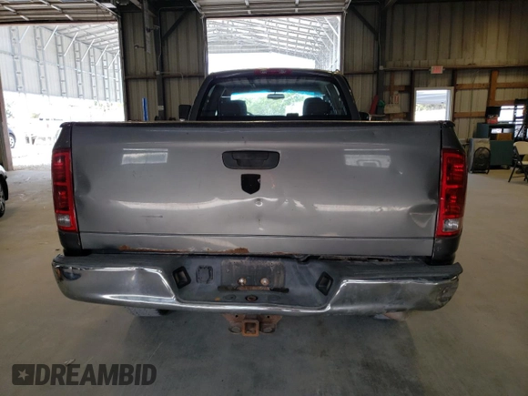 2004 Dodge Ram 2500 SLT with VIN 3D7KU28CX4G146324, listed as a Copart auction lot 69964254 with 244,029 mi miles and Salvage Title. Bid and sale history available at carsss.com. Image 6.