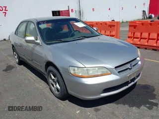 1999 Honda Accord LX with VIN JHMCG5643XC038779, listed as a IAAI auction lot 42392602 with 290,350 mi miles and . Bid and sale history available at DreamBid. Image 1.