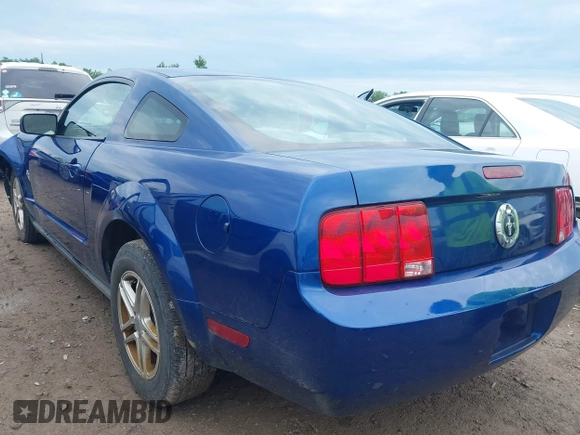 2009 Ford Mustang with VIN 1ZVHT80N795142637, listed as a IAAI auction lot 42595602 with 69,284 mi miles and . Bid and sale history available at DreamBid. Image 3.