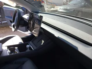 2025 Tesla Model 3 Long Range with VIN 5YJ3E1EB4SF914979, listed as a IAAI auction lot 41695023 with 2,263 mi miles and . Bid and sale history available at DreamBid. Image 5.