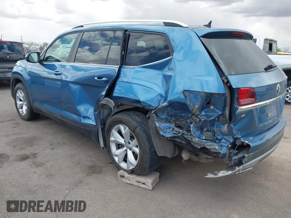 2019 Volkswagen Atlas SE with VIN 1V2WR2CA4KC577548, listed as a IAAI auction lot 41964877 with 74,361 mi miles and . Bid and sale history available at DreamBid. Image 3.