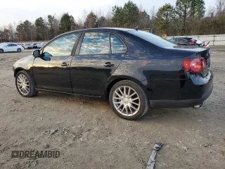 2009 Volkswagen Jetta Wolfsburg Edition with VIN 3VWRJ71KX9M048741, listed as a Copart auction lot 85014594 with 190,739 mi miles and Salvage title. Bid and sale history available at DreamBid. Image 2.