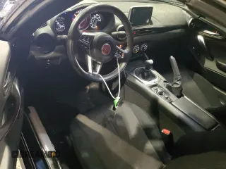 2018 FIAT 124 Spider Classica с VIN JC1NFAEK0J0133862, выставлен на аукционе Copart как лот 56683105 с пробегом 47 565 миль миль и Списание • Salvage title. История ставок и продаж доступна на DreamBid. Изображение 8.