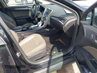 2014 Ford Fusion S with VIN 3FA6P0G75ER387702, listed as a IAAI auction lot 41912113 with 180,002 mi miles. Bid and sale history available at carsss.com. Image 5.