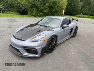 2023 Porsche 718 Cayman GT4 RS z VIN WP0AE2A85PS280082, wystawiony jako Copart lot #61538745 z przebiegiem 1 972 mil mil oraz Czysty tytuł • Clean title. Historia ofert i sprzedaży dostępna na DreamBid. Obrazek 1.