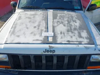 1997 Jeep Cherokee Sport with VIN 1J4FJ68S3VL551278, listed as a IAAI auction lot 41660577 with 282,264 mi miles. Bid and sale history available at carsss.com. Image 10.