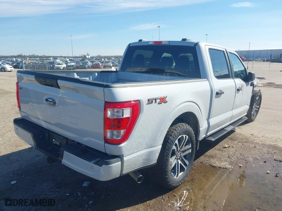 2021 Ford F-150 XL with VIN 1FTEW1C50MKE81542, listed as a IAAI auction lot 41276603 with 80,473 mi miles. Bid and sale history available at carsss.com. Image 4.