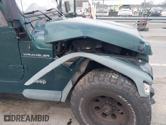 2000 Jeep Wrangler SE with VIN 1J4FA29P0YP728370, listed as a IAAI auction lot 41788463 with 186,995 mi miles. Bid and sale history available at carsss.com. Image 6.