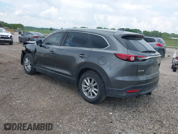 2016 Mazda CX-9 Sport z VIN JM3TCABYXG0126543, wystawiony jako IAAI lot #42256448 z przebiegiem 133 813 mil mil oraz . Historia ofert i sprzedaży dostępna na DreamBid. Obrazek 3.