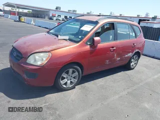 2008 Kia Rondo EX with VIN KNAFG525387174835, listed as a IAAI auction lot 42011406 with 138,656 mi miles. Bid and sale history available at carsss.com. Image 2.