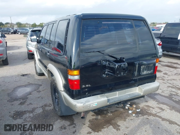 1999 Isuzu Trooper S with VIN JACDJ58X5X7902821, listed as a IAAI auction lot 40762329 with 182,773 mi miles and . Bid and sale history available at DreamBid. Image 3.