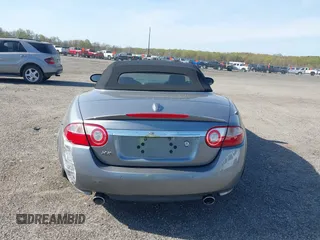 2007 Jaguar XK with VIN SAJWA44B075B11143, listed as a IAAI auction lot 42044257 with 122,842 mi miles. Bid and sale history available at carsss.com. Image 16.