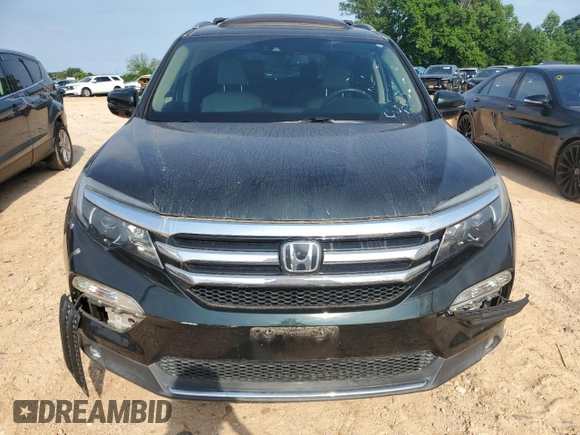 2018 Honda Pilot Elite with VIN 5FNYF6H03JB019900, listed as a Copart auction lot 57497235 with 60,358 mi miles and Salvage title. Bid and sale history available at DreamBid. Image 5.