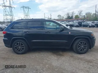 2017 Jeep Grand Cherokee Trailhawk with VIN 1C4RJFLG3HC674489, listed as a IAAI auction lot 42049006 with 91,892 mi miles and . Bid and sale history available at DreamBid. Image 14.