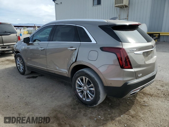 2022 Cadillac XT5 FWD Premium Luxury z VIN 1GYKNCRS9NZ180043, wystawiony jako Copart lot #51352195 z przebiegiem 12 399 mil mil oraz Szkoda całkowita • Salvage title. Historia ofert i sprzedaży dostępna na DreamBid. Obrazek 2.