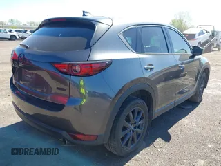 2017 Mazda CX-5 Grand Touring with VIN JM3KFBDLXH0225634, listed as a IAAI auction lot 42092029 with 86,373 mi miles and . Bid and sale history available at carsss.com. Image 4.