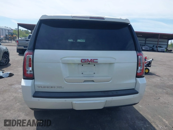 2015 GMC Yukon XL SLT with VIN 1GKS1HKC0FR154518, listed as a IAAI auction lot 41905683 with 162,482 mi miles. Bid and sale history available at carsss.com. Image 16.