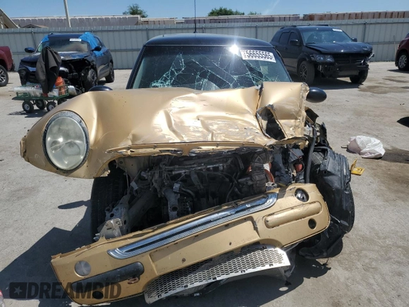 2004 MINI Hardtop z VIN WMWRC33454TC50742, wystawiony jako Copart lot #56655565 z przebiegiem Nie podano mil oraz Szkoda całkowita • Salvage title. Historia ofert i sprzedaży dostępna na DreamBid. Obrazek 5.
