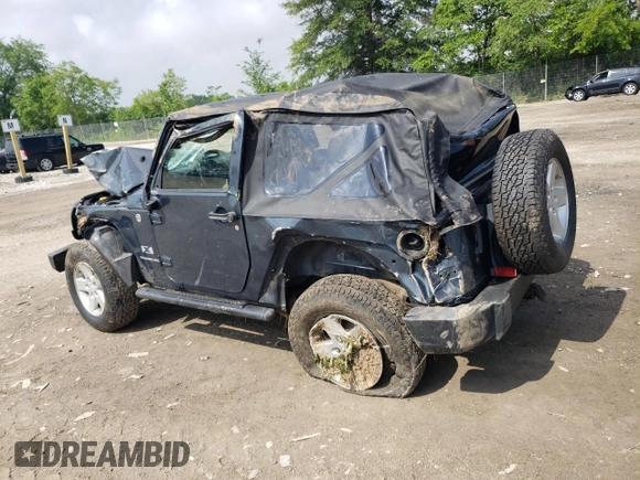 2008 Jeep Wrangler X with VIN 1J4FA24158L563572, listed as a Copart auction lot 58667265 with 162,649 mi miles and Salvage title. Bid and sale history available at DreamBid. Image 2.