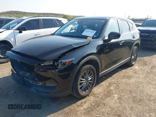 2019 Mazda CX-5 Touring with VIN JM3KFACM6K0533203, listed as a IAAI auction lot 41973125 with 106,882 mi miles and . Bid and sale history available at carsss.com. Image 18.