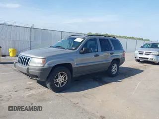 2002 Jeep Grand Cherokee with VIN 1J8GW48N72C207838, listed as a IAAI auction lot 42020294 with 181,283 mi miles and . Bid and sale history available at DreamBid. Image 18.