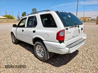 2004 Isuzu Rodeo S z VIN 4S2CK58W544313903, wystawiony jako Copart lot #57535585 z przebiegiem 121 385 mil mil oraz Tytuł czysty. Historia ofert i sprzedaży dostępna na DreamBid. Obrazek 3.