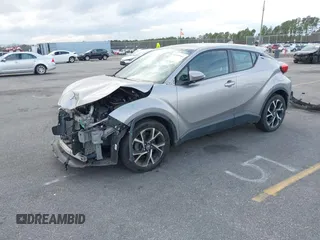 2019 Toyota C-HR XLE with VIN NMTKHMBX7KR078292, listed as a IAAI auction lot 41705966 with 104,352 mi miles. Bid and sale history available at carsss.com. Image 18.