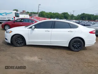 2016 Ford Fusion SE with VIN 3FA6P0HD0GR201247, listed as a IAAI auction lot 42495877 with 126,572 mi miles and . Bid and sale history available at DreamBid. Image 14.